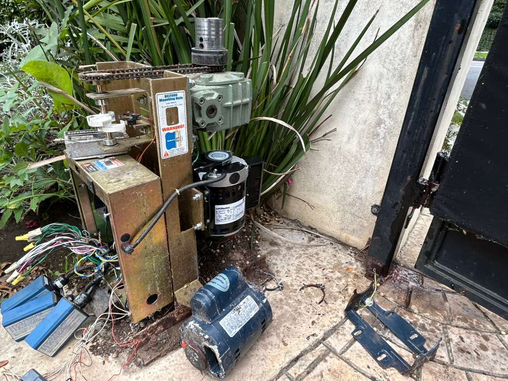 Damaged automatic gate opener motor and wiring in Mid-Wilshire, CA
