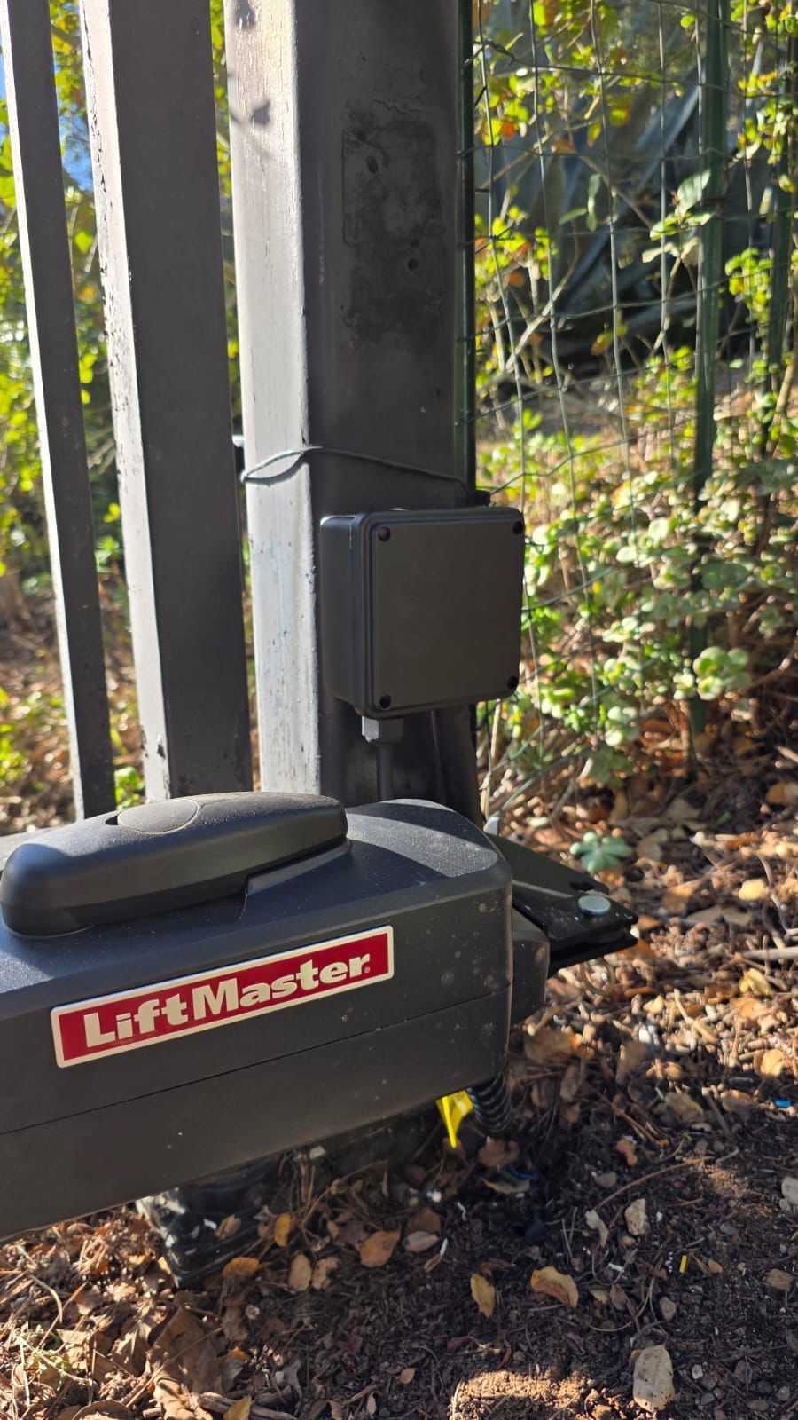 LiftMaster gate opener motor on post with electrical box in North Hollywood, CA